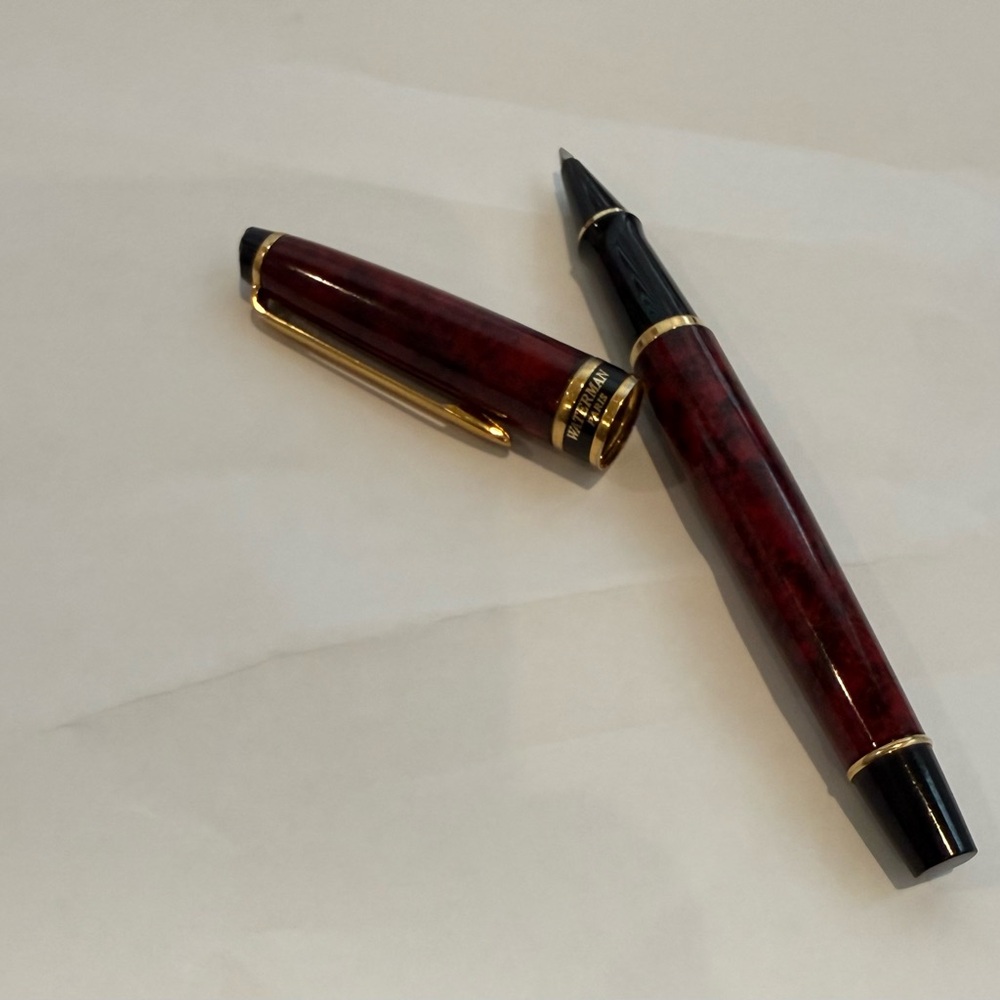 Elegant Burgundy and Gold Rollerball Pen with new refill.